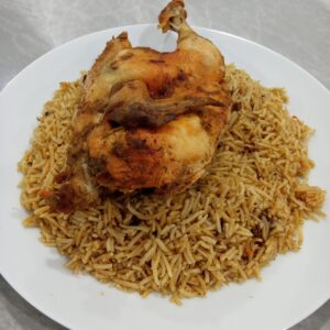 نص دجاج مع الرز Half chicken with rice