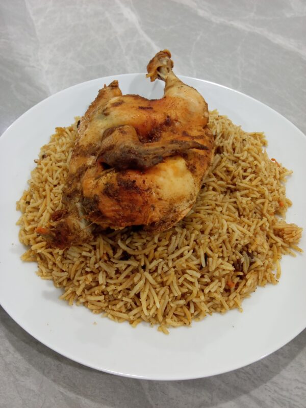 نص دجاج مع الرز Half chicken with rice